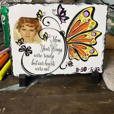 a mother's day card with an image of a woman and butterflies on it