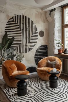 a living room with two chairs and a rug