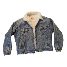 This vintage 1970s Levi's Strauss & Co trucker denim jacket exudes classic style. The Sherpa fleece lining provides warmth, while the blue denim exterior and red tab add a touch of Americana. Size XL.  * Levi's brand denim jacket * 1970s vintage style * Comfortable Sherpa fleece lining * Distinctive red tab detail * Size XL From a non-smoking and pet-free environment. Fast shipping always! Good vintage preowned condition.  No tears or stains.  All buttons intact. Levis Sherpa, Denim Jacket Sherpa, Levis Fur Lined Jacket, Vintage Blue Levi's Outerwear, Levi’s Sherpa Jacket, Levis Denim Jacket, Vintage Pre-washed Denim Blue Outerwear, Levi Strauss & Co, Levis Denim