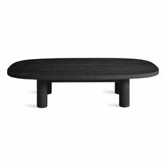 a black table sitting on top of a white floor