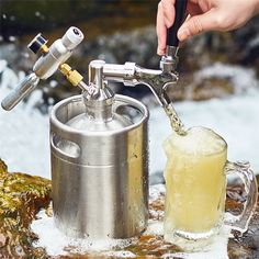 a person is filling a beer from a keg into a water jug with a spigot