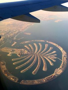 an aerial view of the palm island in the middle of the ocean, taken from above