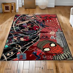 a rug with spiderman on it in the middle of a room