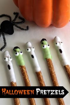 five fake toothbrushes with googly eyes and noses are lined up in a row