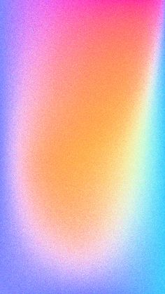 a blurry image of an orange, pink and blue background with the color red