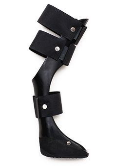 a pair of black boots with two straps on the bottom and one in the middle