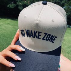 Make a splash with our No Wake Zone Classic Trucker Hat in White/Royal! Perfect for keeping the sun out of your eyes whether you're at the lake, ocean, or poolside. Versatile enough to wear anywhere, this hat adds a touch of fun to any outfit. Dive in and grab yours today! Trendy Adjustable Dad Hat For Beach, Trendy Adjustable Dad Hat For The Beach, Summer Sports Hat With Flat Brim, Sporty Bucket Hat With Curved Brim For Beach, Sporty Summer Sun Cap, Sporty Summer Bucket Hat, Snapback Sun Hat With Upf 50+ For Summer, Summer Sun Hat With Upf 50+ Snapback, Sporty Cap-style Sun Hat For Beach