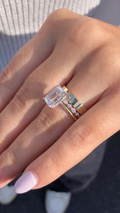 A love story set in gold and 💎✨ #happilyeverafter #emeraldcutdiamond #engagementring #diamondrings #hiddenhalo #radiantcut #engaged… | Instagram Stacked Wedding Rings Square, Wedding Bands For Emerald Cut Rings Gold, Vintage Engagement Ring With Band, Engagement Rings Gold With Wedding Band, Two Band Wedding Ring Set, Rectangle Cut Wedding Ring, Ring Stack With Engagement Ring, Gold Radiant Cut Engagement Ring With Wedding Band Stack, Gold Ring Stack Wedding