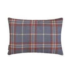 a blue and red plaid pillow on a white background