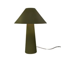 a lamp that is on top of a white surface with a cord attached to it