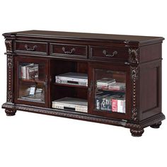 a wooden entertainment center with glass doors and drawers on the bottom shelf, holding dvd's