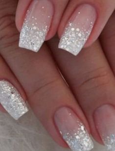 Glitter And White French Tip Nails, White Silver Glitter Nails, Snowy Nails White Glitter, Summer Acrylic Nails Glitter, White Nails With Glitter Tips, Sparkly White Acrylic Nails, French Tip Nails With Design Glitter, Nude Nails With Silver Glitter, Pretty Ombre Nails Sparkle