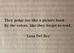 an old book with a quote on it that says they judge me like a picture book by the colors, like they forgot to read