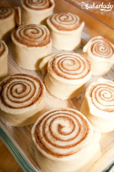 cinnamon rolls on a baking sheet ready to go into the oven or bake in the oven