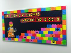 a bulletin board with legos on it that says building a strong foundation in math