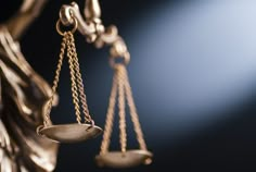 the scales of justice are shown in this image