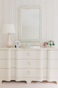 Looking for coastal preppy bedroom inspiration & timeless little girl bedroom decor ideas? This incredible 9 drawer dresser is a true statement piece for any modern traditional bedroom design! Shop this art deco dresser & more timeless bedroom decor today at Mintwood Home! Modern Traditional Bedroom, Traditional Nursery, Pink Lamp, Styling Shelves, Vase Lamp, Traditional Bedroom Decor, Girl’s Room, Pink Nursery, Striped Wallpaper