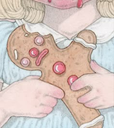 a drawing of a girl holding a gingerbread cookie with pink icing on it