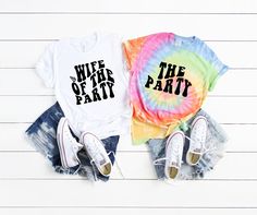 two t - shirts with the words wife of the party printed on them next to denim shorts