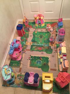 a play area with toys on the floor