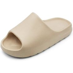 Finish your Spring and Summertime looks with LAVRA Womens Cushion Slides Summer Beach Pillow Sandals! These pillow slide sandals are made from a soft rubber material to keep your feet feeling cool and comfortable as you travel through the day! They feature an ultra-cushioned contoured footbed that is gentle on the feet and lugged platform soles ideal for long-time wear. Pair them with a wide range of outfits from sundresses to shorts and a comfy t-shirt for a stylish warm-weather vibe! Available Beach Pillow, Cloud Slides, Beach Pillows, Of Outfits, Rubber Material, Soft Rubber, Slide Sandals, Summer Beach, Warm Weather