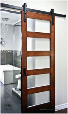 an open sliding door in a bathroom