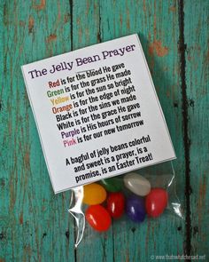 the jelly bean prayer card is on top of some candy