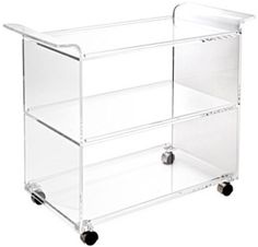 a clear plastic cart with three drawers on wheels