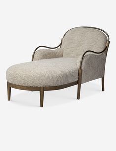 the chaise lounge chair is made from wood and has a beige upholstered fabric