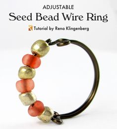 an adjustable bead wire ring with red and gold beads on black leather cord, against a white background