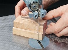 a person using a planer to cut wood with a circular sawtoothing tool