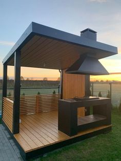 a hot tub sitting on top of a wooden deck