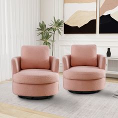 two pink chairs sitting next to each other on top of a carpeted room floor