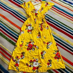 Loft | Yellow Floral Wrap Dress Size Large! Functional Wrap Dress. Never Worn But Tags Removed. Could Be Styled As Wrap Dress Or Swimsuit Coverup. Yellow Floral Print V-neck Maxi Dress, Summer Yellow Rayon Maxi Dress, Vibrant Yellow Fitted Maxi Dress, Vibrant Fitted Yellow Maxi Dress, Yellow Fitted Rayon Dress, Fitted Yellow Rayon Dress, Yellow Floral Print Maxi Sundress, Vibrant Yellow Spring Dresses, Casual Floral Print Mustard Maxi Dress