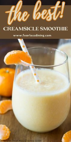 an orange smoothie in a glass with the words, the best creamsice smoothie