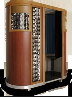 a wooden cabinet with many pictures on the front and back doors, in an open position