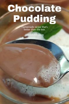 chocolate pudding in a glass bowl with spoon