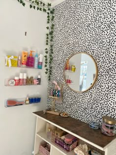 a mirror and shelves in a room with various items on the wall, including bottles