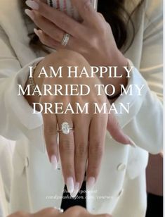 a woman holding a cell phone in her hand with the caption i am happily married to my dream man