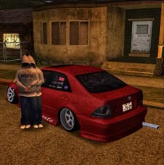 a person standing next to a red car in a driveway with a house behind it