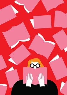 a person with glasses reading a book surrounded by pink papers