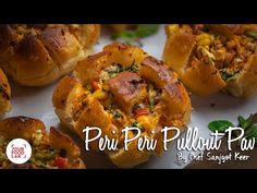 some breads with different toppings are on a white plate and there is the words peri peri pullout pan