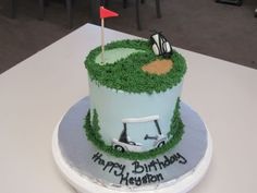 a golf themed birthday cake on a table