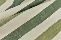 green and white striped fabric close up