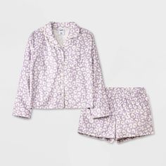 They'll love the cool comfort this 2-Piece Long-Sleeve Coat Pajama Set from art class™ brings to their bedtime routine. This set includes a sleep shirt and shorts, both crafted from recycled polyester knitted fabric for comfortable wear. The long-sleeve button-down shirt features a classic notched collar with a chest patch pocket, while the shorts have a full elastic waistband for a snug fit. Mix and match the set with other PJ separates for a variety of looks. art class™: One-of-a-kind looks fo Casual Leopard Print Sleepwear For Loungewear, Casual Fall Sets For Sleepovers, Fitted Leopard Print Sleepwear For Loungewear, Cozy Pajamas, Long Sleeve Coat, Girls Sleepwear, Shirt And Shorts, Bedtime Routine, Long Sleeves Coats