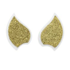 two pairs of gold glitter tears on white background