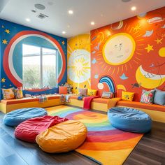 the children's room is brightly colored and has bean bags on the rugs