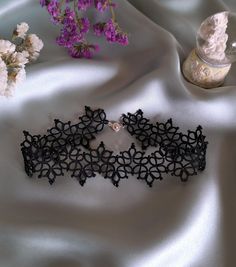 Lace Tatting Necklace - A Beautiful Handmade Accessory This lovely lace choker is made using the tatting technique, giving it a unique and delicate look. Handmade with high-quality thread, this choker has a delicate, airy feel that adds a sophisticated touch to any outfit.  Ideal for weddings, special events, or simply for those who appreciate unique accessories. This choker is also a wonderful gift for lovers of vintage style and handmade jewelry. After payment I will need about 5 days to create and ship your order. If you have any questions please feel free to contact me. Please note that washing lace accessories is not advised, as it can weaken the fibers and cause the lace to lose its shape. Additionally, the metal in the clasp is sensitive to moisture, so keep it away from the humid e Lace Tatting, Choker Necklace Handmade, Tatting Necklace, Lace Choker Necklace, Handmade Chokers, Lace Accessories, Lace Choker, Lace Necklace, Black Choker