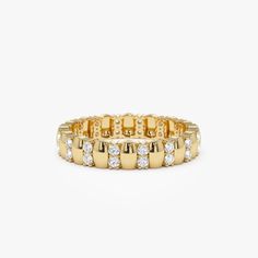 an 18k yellow gold and diamond bracelet, with rows of diamonds on each side