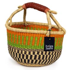 an orange and green basket with a brown handle